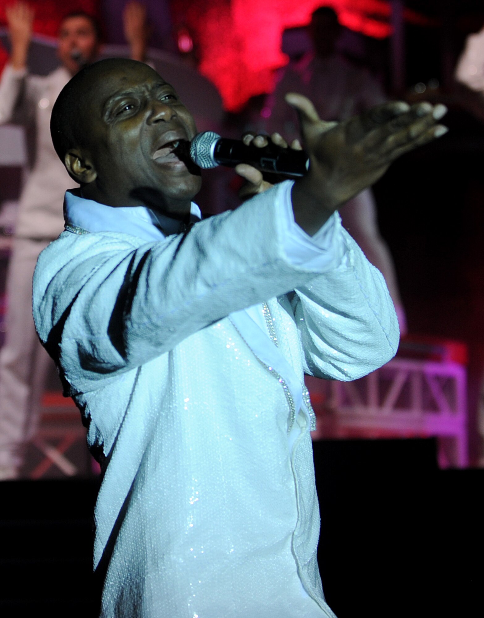 Hampton, Va. -- Tech. Sgt. Octavious Hill, vocalist, performs a solo during the Tops in Blue performance at the Hampton Roads Convention Center, Feb. 9. Tops in Blue, the Air Force’s premier entertainment group, is composed of vocalists and instrumentalists representing a wide range of career fields who tour all over the world captivating military and civilian audiences with high energy shows. (U.S. Air Force photo/Airman Rebecca Montez)