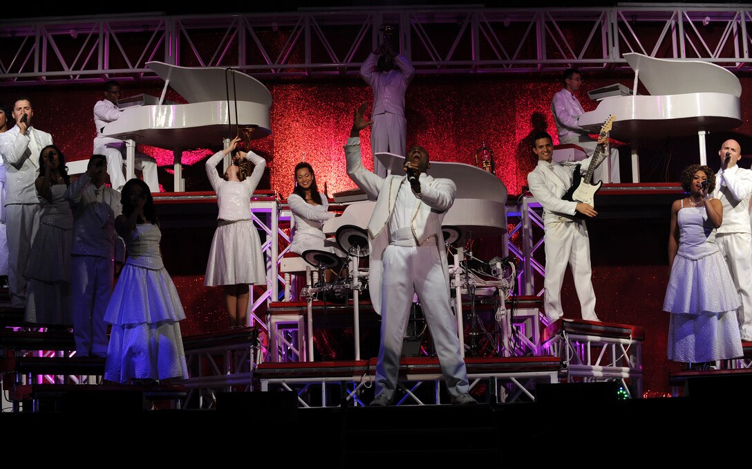 Hampton, Va. -- Tops in Blue performs for a full house at the Hampton Roads Convention Center Feb. 9. As the Air Force’s premier entertainment group, the band is composed of vocalists and instrumentalists representing a wide range of career fields who tour all over the world captivating military and civilian audiences with high energy shows. (U.S. Air Force photo/Airman Rebecca Montez)