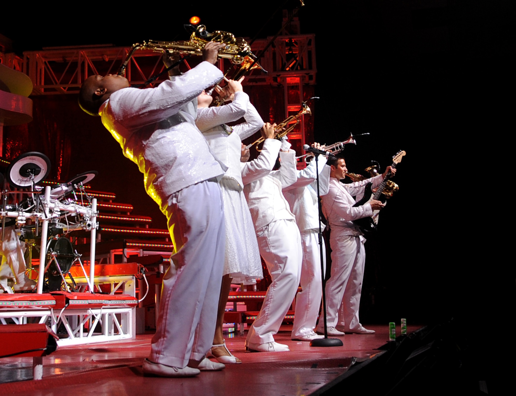 Instrumentalists from Tops in Blue perform a solo during their performance at the Hampton Roads Convention Center, Feb. 9. Tops in Blue, the Air Force’s premier entertainment group, is composed of vocalists and instrumentalists representing a wide range of career fields who tour all over the world captivating military and civilian audiences with high energy shows. (U.S. Air Force photo/Airman Rebecca Montez)