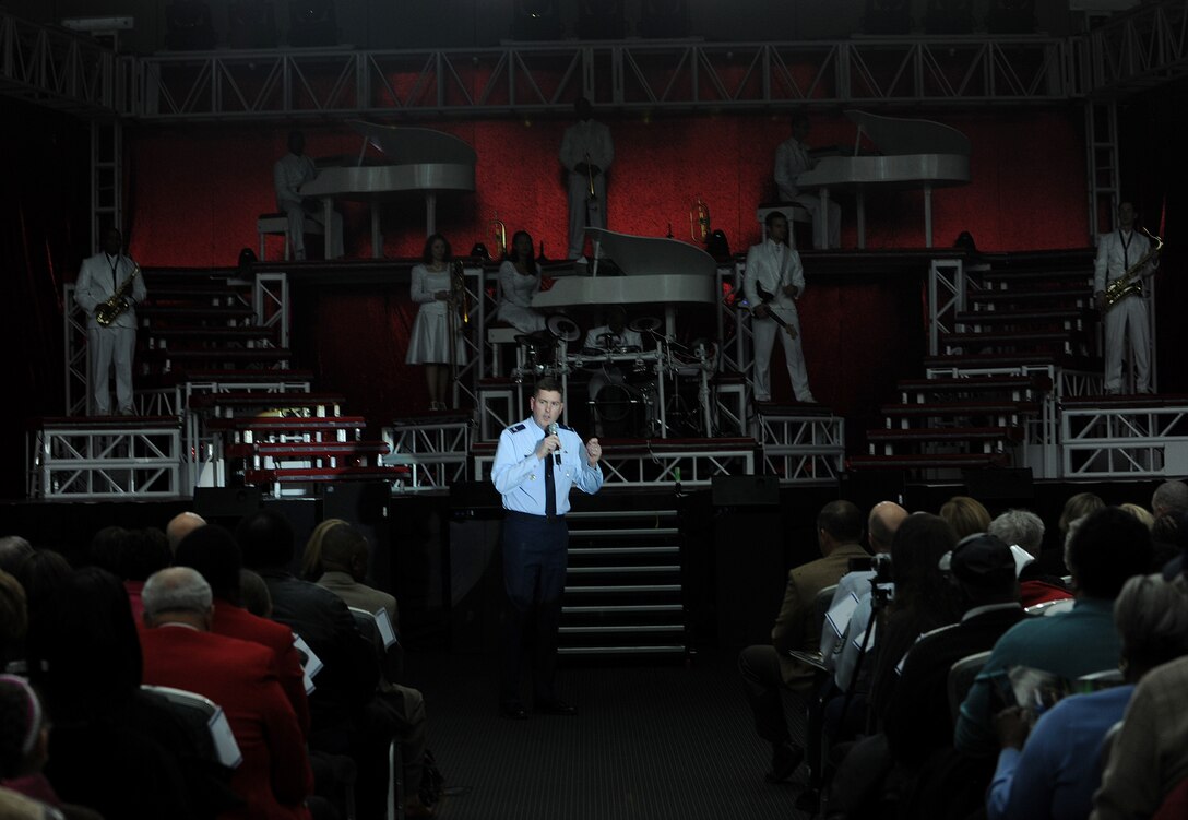 Hampton, Va. -- Col. Donald E. Kirkland, 633d Air Base Wing commander, greets the audience before the Tops in Blue performance at the Hampton Roads Convention Center, Feb. 9. Tops in Blue, the Air Force’s premier entertainment group, is composed of vocalists and instrumentalists representing a wide range of career fields who tour all over the world captivating military and civilian audiences with high energy shows. (U.S. Air Force photo/Airman Rebecca Montez)