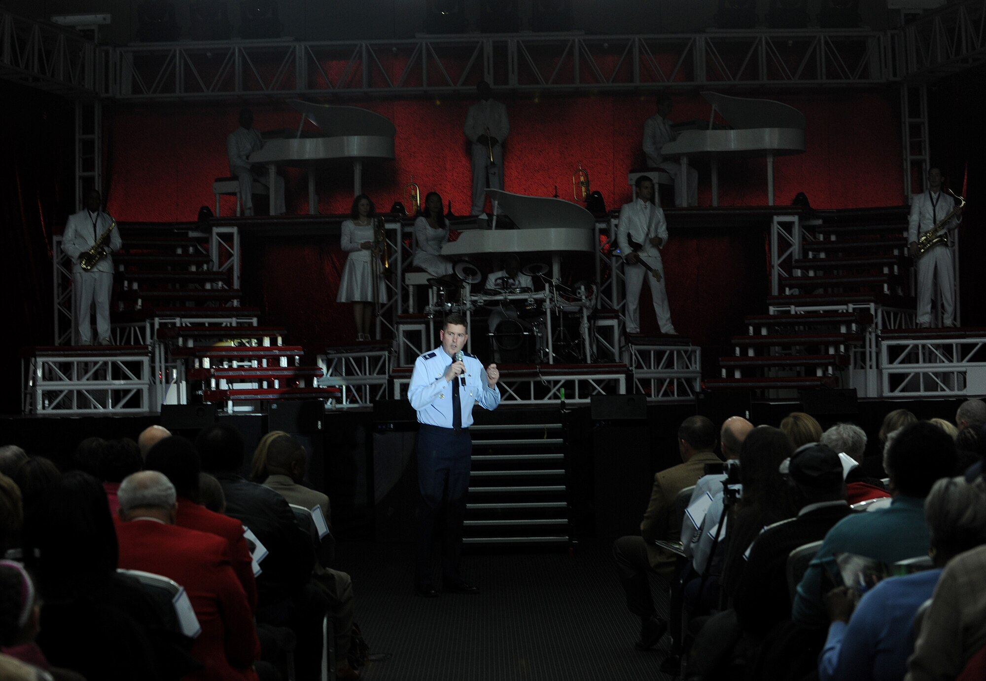 Hampton, Va. -- Col. Donald E. Kirkland, 633d Air Base Wing commander, greets the audience before the Tops in Blue performance at the Hampton Roads Convention Center, Feb. 9. Tops in Blue, the Air Force’s premier entertainment group, is composed of vocalists and instrumentalists representing a wide range of career fields who tour all over the world captivating military and civilian audiences with high energy shows. (U.S. Air Force photo/Airman Rebecca Montez)