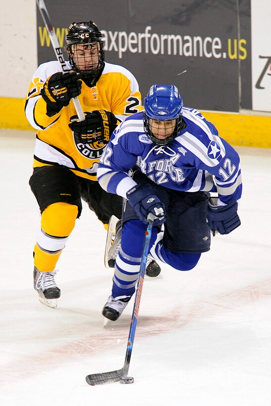 U.S. Air Force Academy senior forward Matt Fairchild skates away from traffic as 10th-ranked Colorado College beat Air Force 2-0 in a non-conference hockey game Feb. 5, 2010, at the World Arena in Colorado Springs, Colo. Air Force fell to 12-11-6 overall and returns to the ice at RIT, Feb. 26-27 in Rochester, NY.   (U.S. Air Force photo/Mike Kaplan)