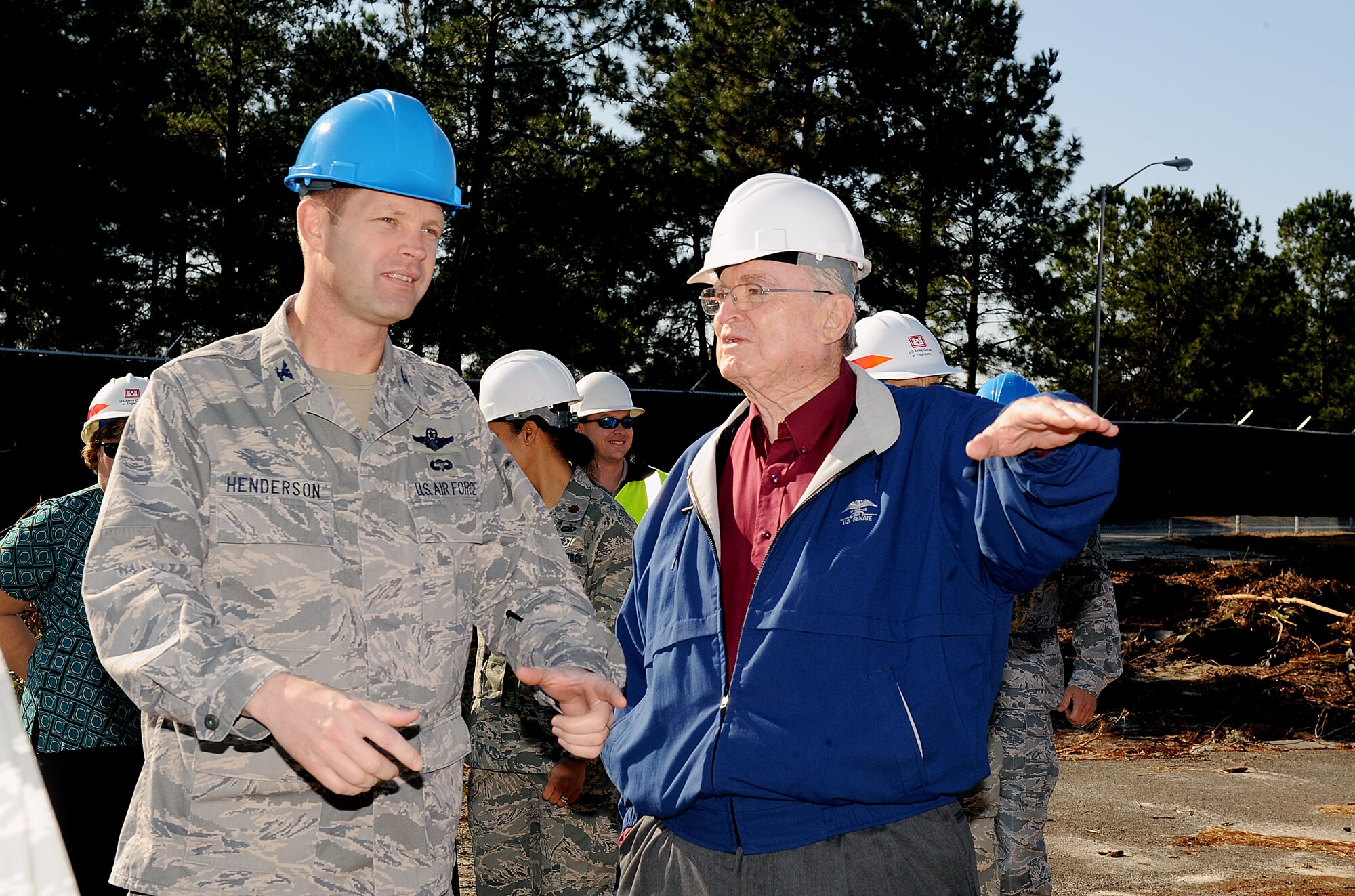 MOODY AIR FORCE BASE, Ga. -- Col. Gary Henderson, 23rd Wing commander, and Parker Greene speak about the new Child Development Center construction project here Feb. 8. The houses of former wing commanders, vice commanders and command chief master sergeants will be destroyed to make room for the center. (U.S. Air Force photo by Airman 1st Class Joshua Green) 
