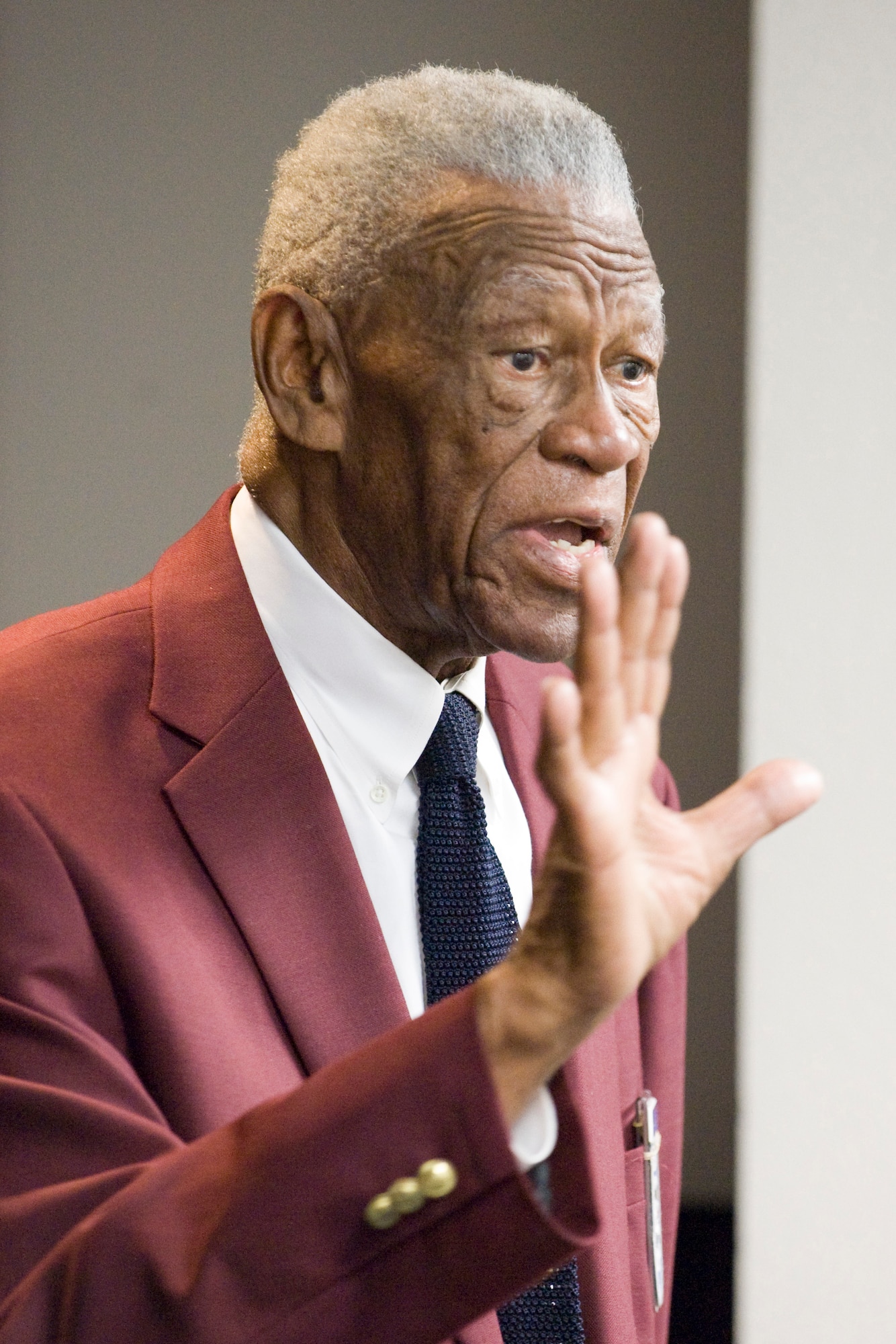 Tuskegee Airman and Negro American League baseball star John "Mule" Miles tells the story of his at-bat against the great Satchel Paige, which ended after the second strike because, he told his manager, he couldn't see Satchel's blazing pitches. Mr. Miles was a guest speaker at the second annual Tuskegee Heritage Breakfast Feb. 8 at the 99th Flying Training Squadron here. (U.S. Air Force photo/Steve Thurow)