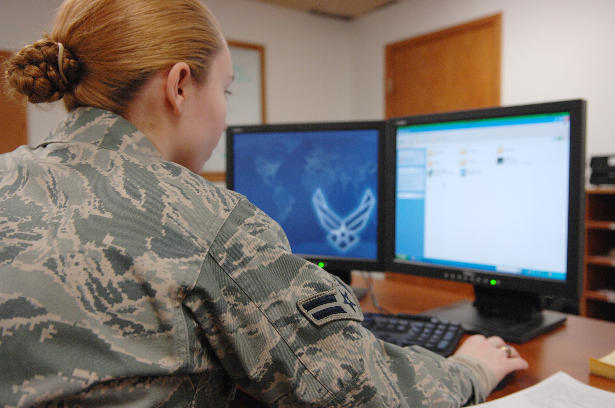 Airman 1st Class Sonny Macias installs software on a client computer Feb. 9, 2010, Eielson Air Force Base, Alaska. Client Support Administrators maintain more than 2,200 computers to ensure mission success and support the 354th Fighter Wing's prepare, deploy and enable mission. Airman Macias is assgined to the 354th Communications Squadron.