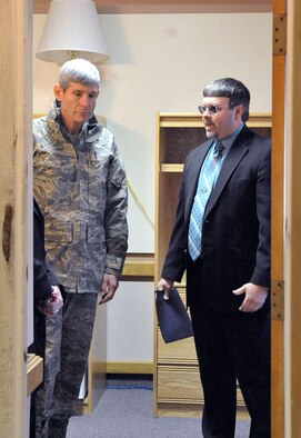 Gen. Norton Schwartz, Air Force chief of staff, tours  the dormitories with Tim Farmer, 27th Special Operations Civil Engineer Squadron, during his visit to Cannon Air Force Base, N.M., Jan. 26. The general got a first-hand look at current dormitories and a briefing on remodelling plans and future construction. (U.S. Air Force photo by Staff Sgt. Heather R. Redman