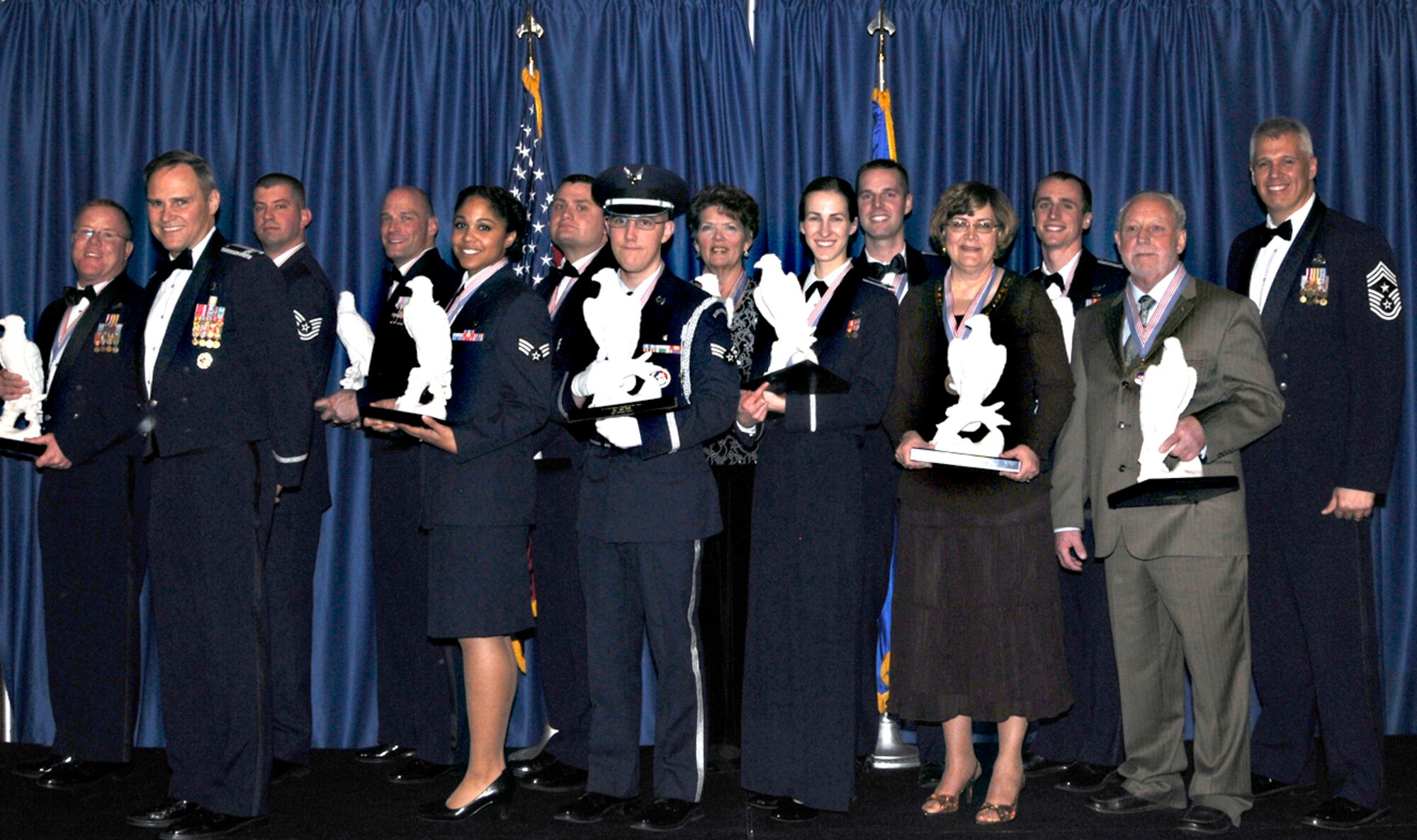 Forty-one outstanding Team Vance members competed in 12 categories for Vance’s annual awards, presented at a banquet Friday, Feb. 5, in the Vance Collocated Club. Front row from left: Col. Chris Nowland, 71st Flying Training Wing commander, Senior Airman Sylvia Lake, Senior Airman Joshua Lewis, 1st Lt. Agneta Murnan, Melva Glaser and Cecil Zimmerman. Back row from left: Senior Master Sgt. Mark Holling, Tech. Sgt. Jonathan Clegg, Master Sgt. Steven Reddecliff, Tech. Sgt. Richard White, Sharron Schaefer, Capt. Rodney Dwyer, Capt. Matthew Gjertsen and Chief Master Sgt. M. Kenui Balutski, 71st FTW command chief. (U.S. Air Force photo/ Angie Roche)