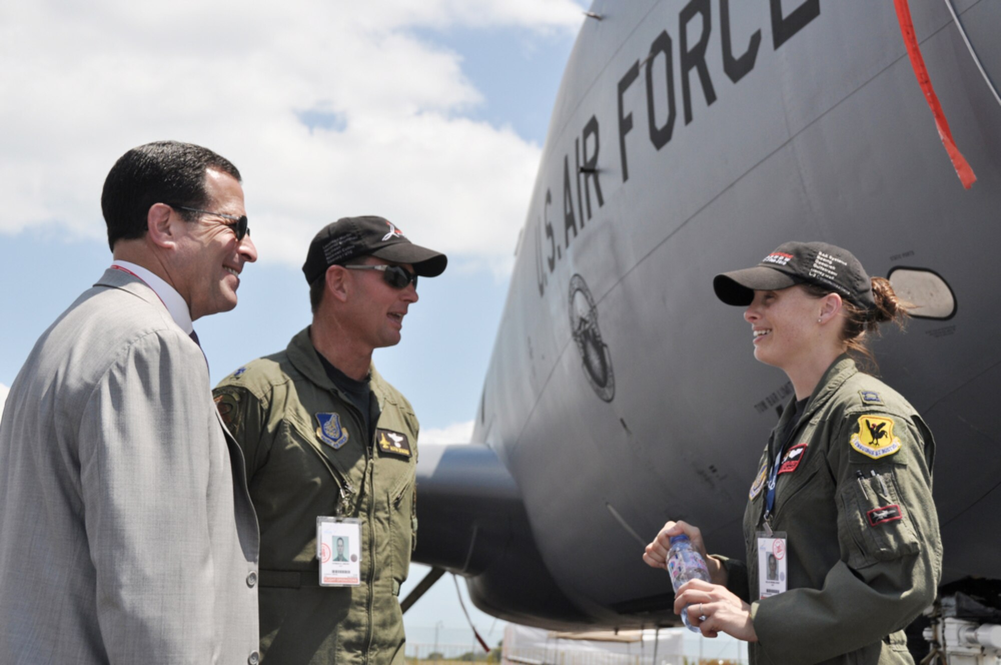 Undersecretary of the Air Force for international affairs Bruce Lemkin meets with Lt. Col. Norman Dimond and Capt. Hollie Disselhorst as the undersecretary tours the U.S. military KC-135 Stratotanker static display during Singapore Airshow 2010 Feb. 3, 2010, in Changi, Singapore. Colonel Dimond and Captain Disselhorst are KC-135 Stratotanker pilots from the 18th Wing at Kadena Air Base, Japan. (Defense Department photo/Tech. Sgt. Cohen Young)