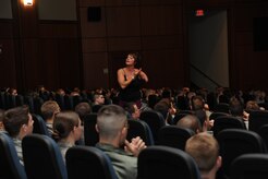 Sarah Panzau speaks to Joint Team Charleston members about the consequences of drinking and driving at the base theater here Feb. 9. Ms. Panzau was involved in a drunk driving related traffic accident and now tours the country speaking against drunk driving. (U.S. Air Force photo/Senior Airman Katie Gieratz)(RELEASED)