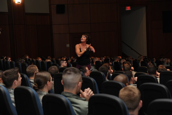 Sarah Panzau speaks to Joint Team Charleston members about the consequences of drinking and driving at the base theater here Feb. 9. Ms. Panzau was involved in a drunk driving related traffic accident and now tours the country speaking against drunk driving. (U.S. Air Force photo/Senior Airman Katie Gieratz)(RELEASED)