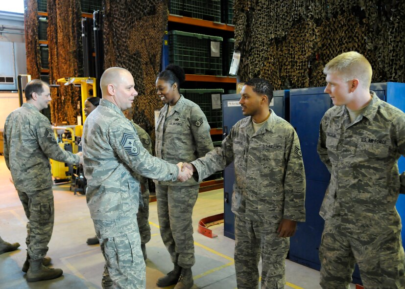 RAF MILDENHALL, England -- Chief Master Sgt. Dennis Vannorsdall, 3rd Air Force command chief, greets Airmen from the mobility processing center Feb. 9.  (U.S. Air Force photo/Staff Sgt. Christopher L. Ingersoll)