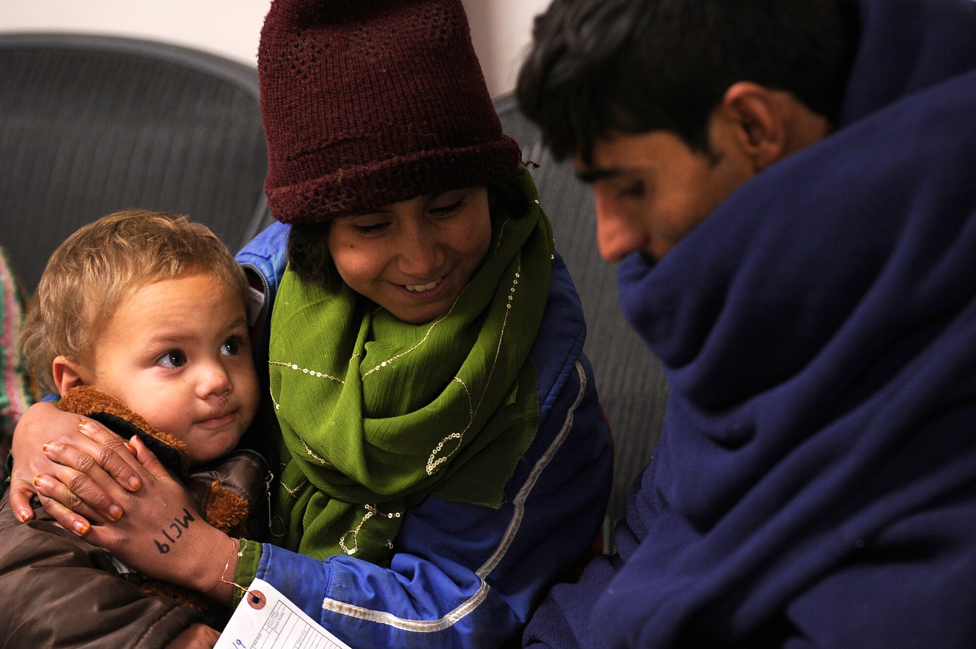 A family of avalanche survivors waits to be seen at Craig Joint Theater Hospital, Bagram Airfield, Feb. 9, 2010. Dozens of Afghans were taken to Bagram Airfield after an avalanche struck a mountain pass in the Parwan province in north eastern Afghanistan. (U.S. Air Force photo by/ Tech. Sgt. Jeromy K. Cross/released)