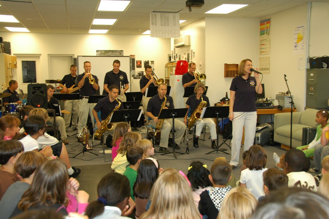 Check Six performs for DoDDs music students at Lajes High School in the Azores.