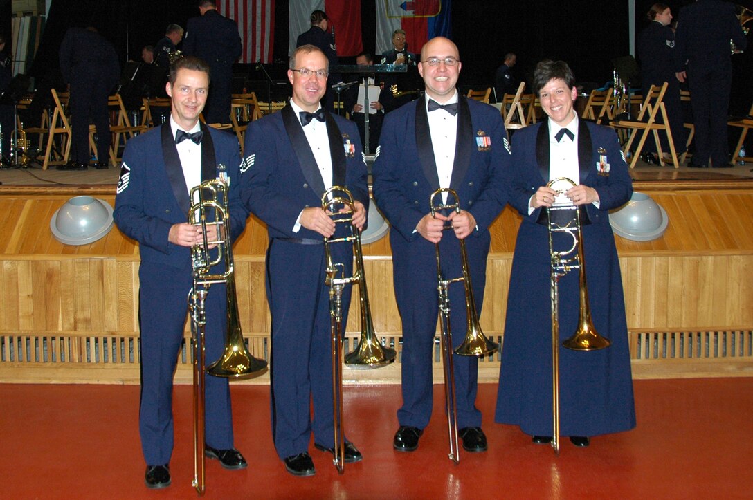 The USAFE Band trombonists pose before a 2009 Holiday concert in Kaiserslautern, Germany.