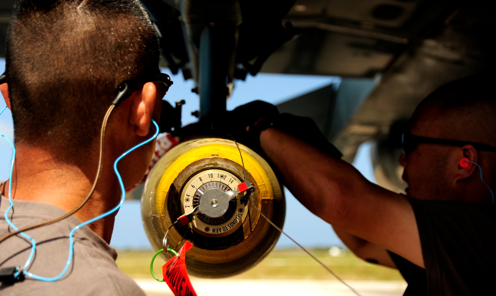 Japanese maintenance crew members T/Sgt Hiroshi Saito(left) and T/Sgt Kenioki Sakamoto, 8th Combat Wing, 6th TF Squadron, Tsuiki AB, Japan, prepare their F2 for weapons upload during Cope North on Andersen Air Force Base, Guam on Feb. 9, 2010. The United States Air Force and the Japanese Air Self-Defense Force conduct Cope North annually to increase combat readiness and interoperability, concentrating on coordination and evaluation of air tactics, techniques, and procedures. The ability for both nations to work together increases their preparedness to support real-world contingencies.
(USAF photo by Staff Sgt. Andy M. Kin)
