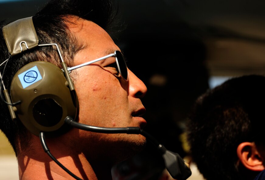 Japanese maintenance crew member M/Sgt. Tabayokz Ochino of the 8th Combat Wing, 6th TF Squadron, Tsuiki AB, Japan, prepare their F2 for ammunitions during Cope North on Andersen Air Force Base, Guam on Feb. 9, 2010.The United States Air Force and the Japanese Air Self-Defense Force conduct Cope North annually to increase combat readiness and interoperability, concentrating on coordination and evaluation of air tactics, techniques, and procedures. The ability for both nations to work together increases their preparedness to support real-world contingencies.(USAF photo by Staff Sgt. Andy M. Kin)