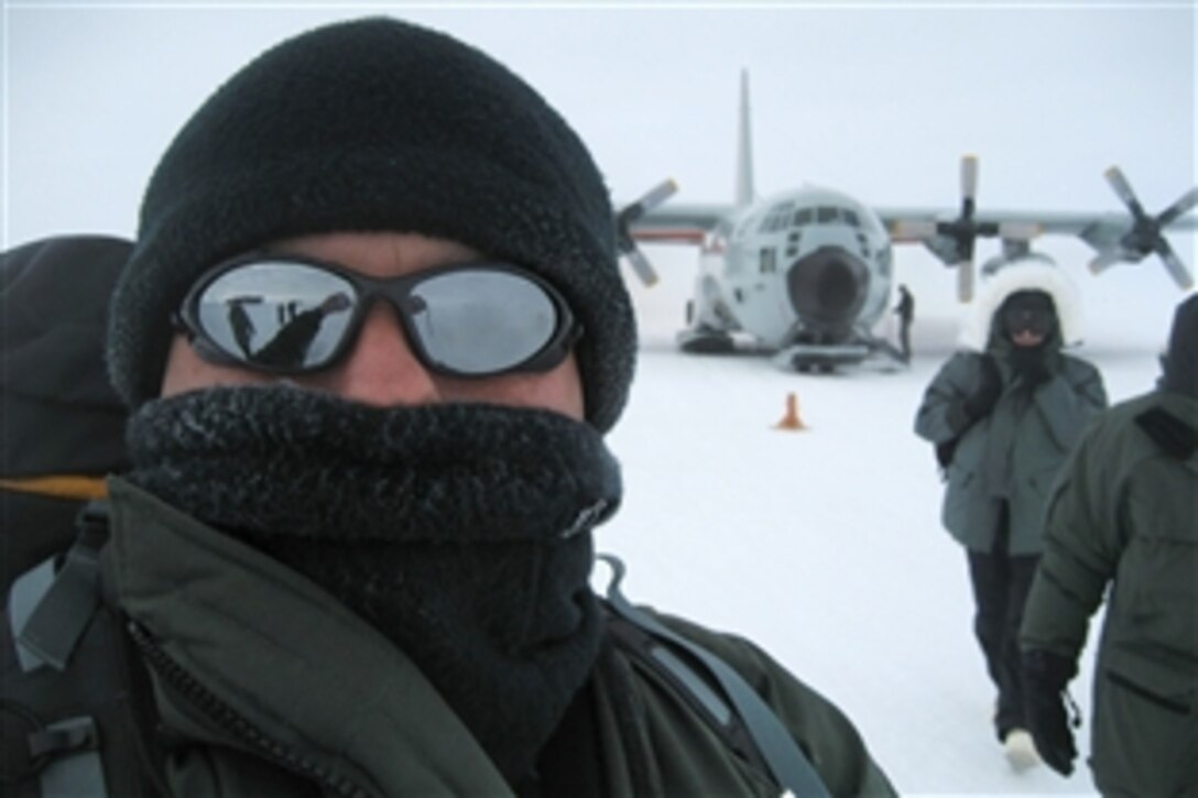 U.S. Navy Cmdr. Scott Shackleton arrives at the South Pole for a brief visit Feb. 9, 2010. Shackleton, a distant relative of the famous Antarctic explorer Sir Ernest Shackleton, is a Navy reservist assigned to the Military Sealift Command. He just wrapped up about two weeks at Antarctic research post McMurdo Station, where he was one of two cargo officers overseeing the offload of two of the command's ships that delivered fuel and supplies to the station.