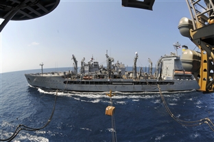 The amphibious assault ship USS Essex receives supplies from the Military Sealift Command fleet replenishment oiler USNS Tippecanoe during a replenishment in the Gulf of Thailand, Feb. 7, 2010. The Essex, part of the forward-deployed Essex Amphibious Ready Group, is participating in Cobra Gold, a multinational exercise co-sponsored by the United States and Thailand.