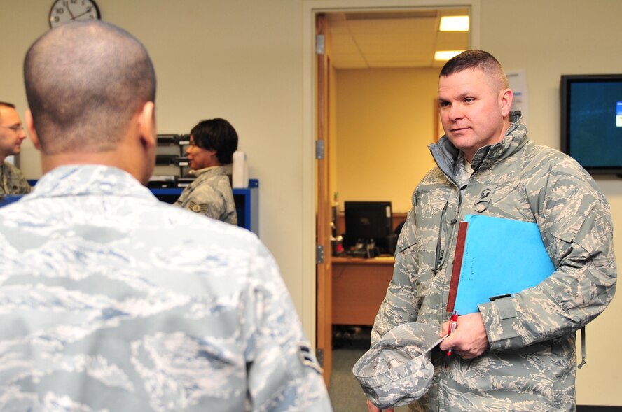 Master Sgt. Michael Wilson, 4th Fighter Wing ground safety superintendent, speaks with an Airman about precautions he should take when traveling long distances during an inspection of the 334th Fighter Squadron's life support section on Seymour Johnson Air Force Base, N.C., Feb. 9, 2010. Airman under the age of 26 must submit a risk assessment sheet to their supervisor before being permitted to take leave. Wilson hails from Pax, W. Va. (U.S. Air Force photo/Senior Airman Rae Perry)