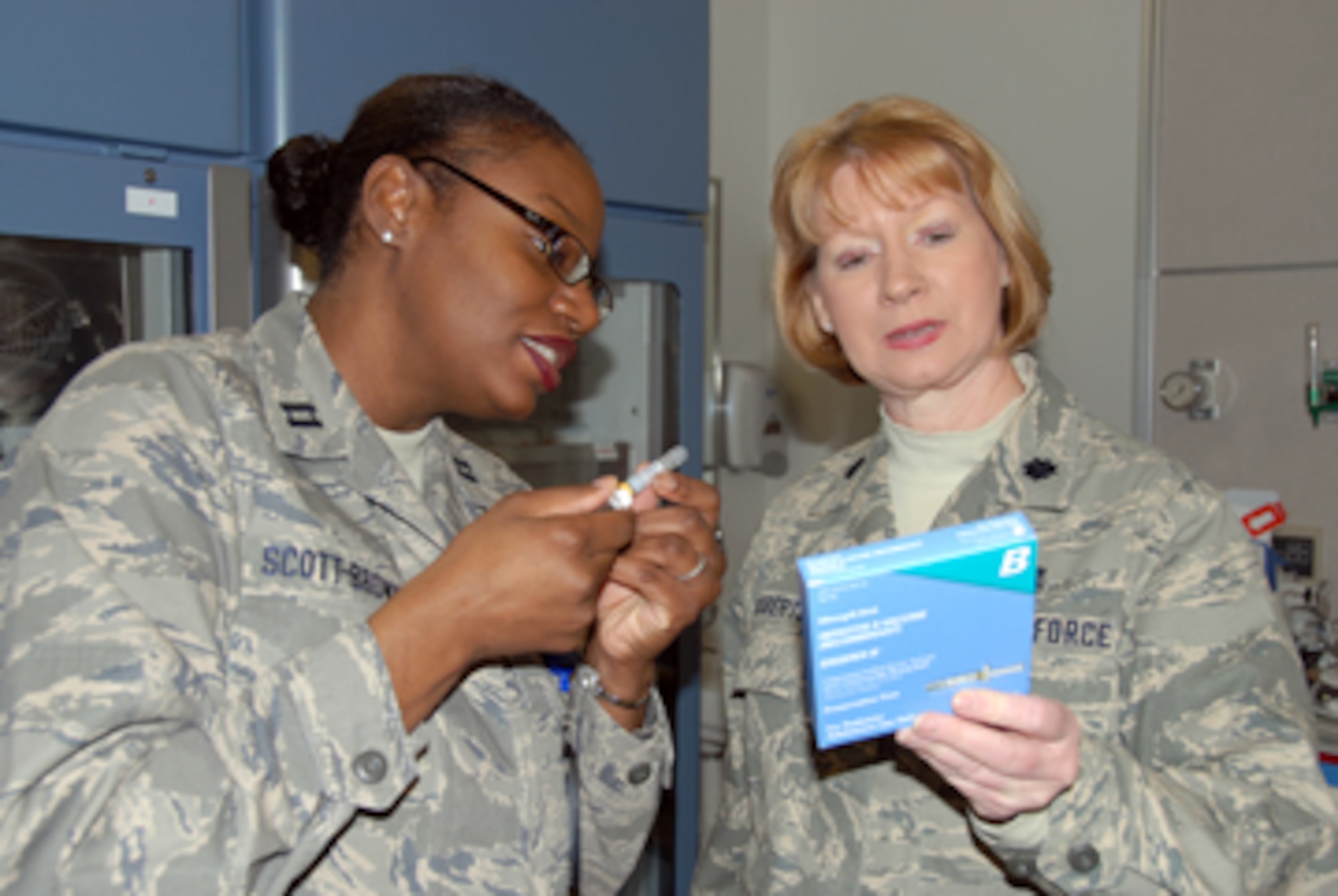 Capt. Sherteria Scott-Brown, left, of the 908th Airlift Wing's Aeromedical Staging Squadron, and Lt. Colonel Donna Roberts inspect the expiration dates on a shipment of Hepatitis B vaccine. Those preparing to deploy should take precautions to protect against the three strains of the disease. According to the World Health Organization, nearly one third of the world's population, more than 2 billion people, have been infected with the Hepatitis B virus. Hepatitis C is transmitted by blood-to-blood contact. Chronic infection can cause inflammation of the liver, which can progress to scarring of the liver. In some cases, liver failure or liver cancer can develop.