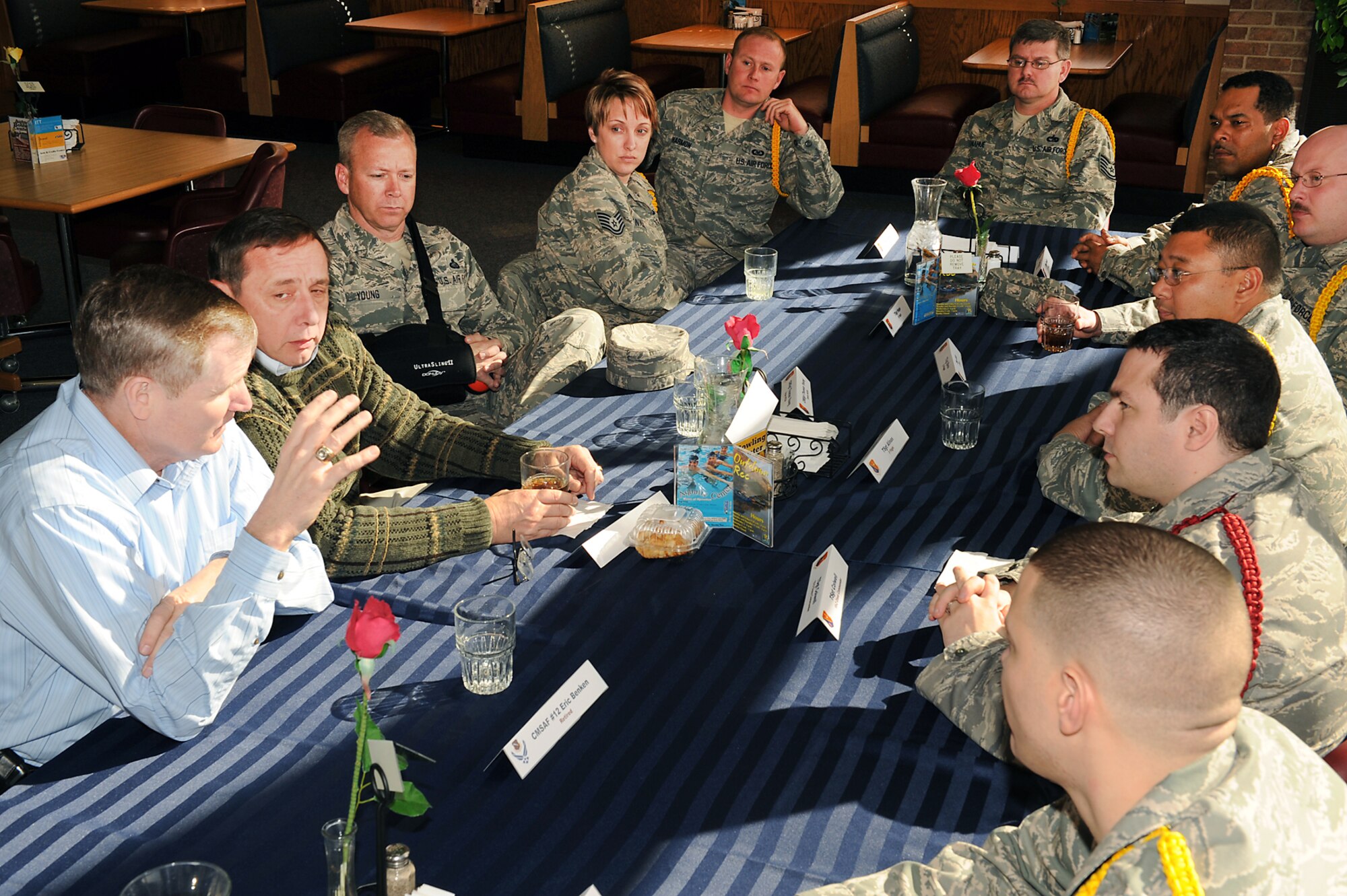 PETERSON AIR FORCE BASE, Colo. -- Former Chief Master Sergeants of the Air Force Eric Benken (left) and Jim Finch (second from left) field questions from technical sergeants attending the Forrest L. Vosler NCO Academy at the Aragon Dining Facility, Feb. 2. Chiefs Benken and Finch spent three days at Peterson talking with NCOA students and cadre. (U.S. Air Force photo/ Senior Airman Erica Picariello)

