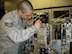 Staff Sgt. Karl Muench Jr., of the 7th Component Maintenance Squadron, Dyess AFB,Texas, performs frequency adjustments to a B-1 Band 4-8 receiver mounted on a Radar and Electronic Warfare test station.  The Band 4-8 Receiver recently underwent a B1-B Repair Network Integration proof of concept live test. The test demonstrated whether the repair network could re-optimize and balance capacities to meet a workload requirement of 15 serviceable assets within a 90- day period. (U.S. Air Force Photo/ MSgt Kenneth Bamberger)

