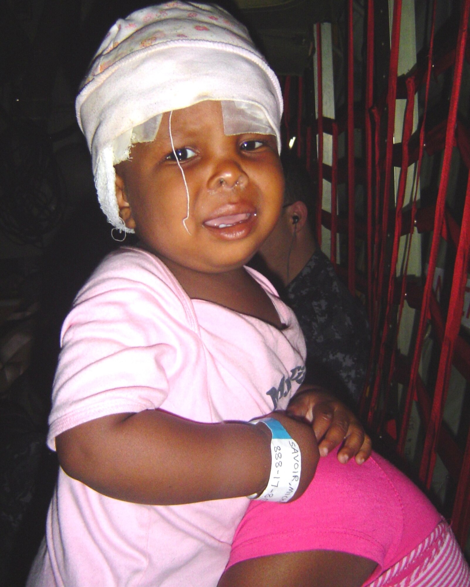 A 13-month-old girl with a skull fracture was one of Keesler’s CCATT patients who was transported on a C-130 Hercules Feb 7 to medical facility in the United States for care. Keesler CCAT teams are providing medical care to victims of the Haiti earthquake who are airlifted to hospitals in the United States. (U.S. Air Force photo/Maj. (Dr.) Stephen Boskovich)