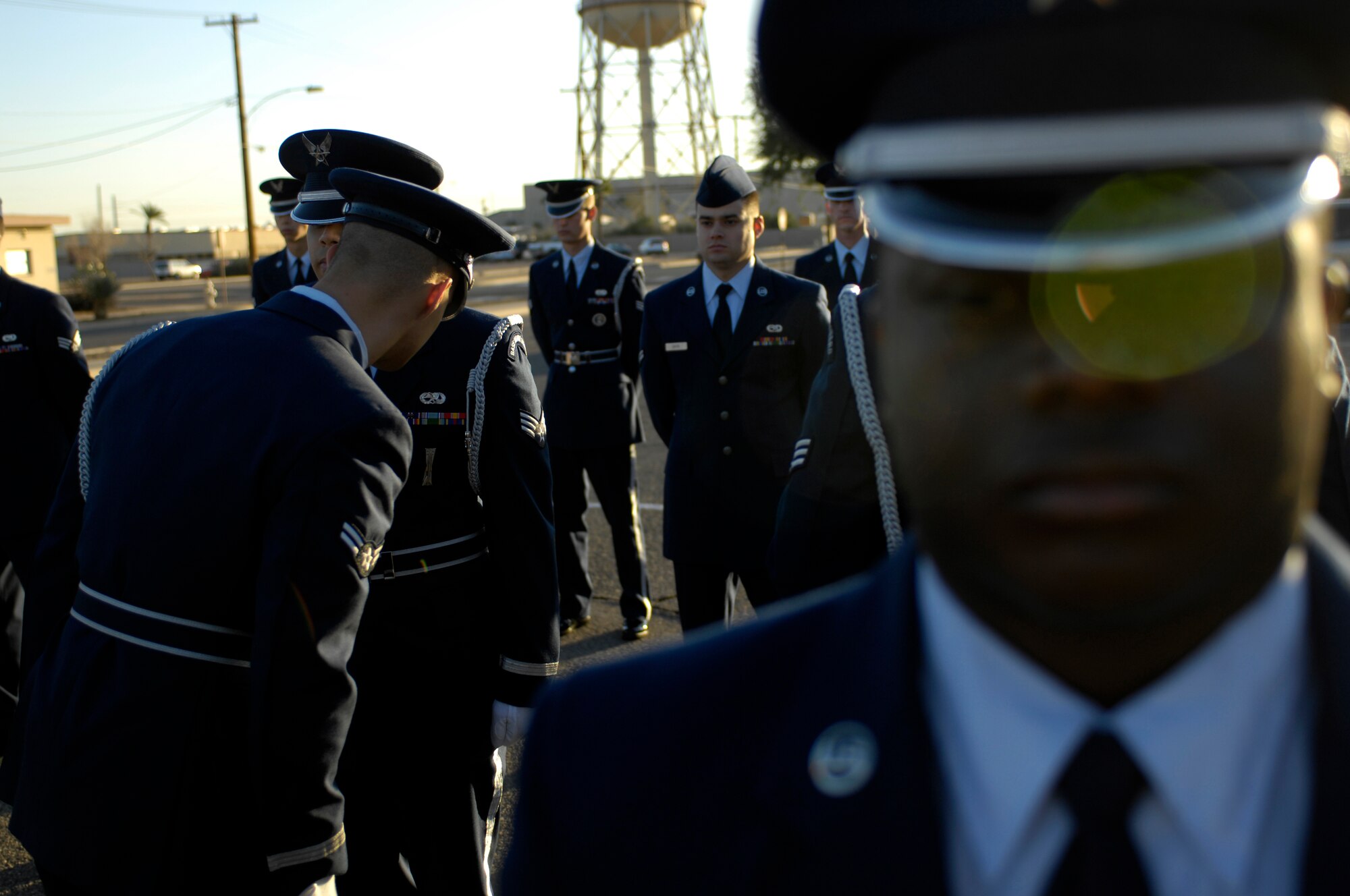 Airman 1st Class Michael Giles, Luke Honor Guard Flight Sergeant, inspects members of the Honor Guard during an open ranks inspection on the morning of Feb. 9, 2010 at Luke Air Force Base, Ariz. Daily training is required for the Honor Guard members to stay proficient at the tasks they are required to do. (U.S. Air Force Photo by SSgt Jason Colbert)