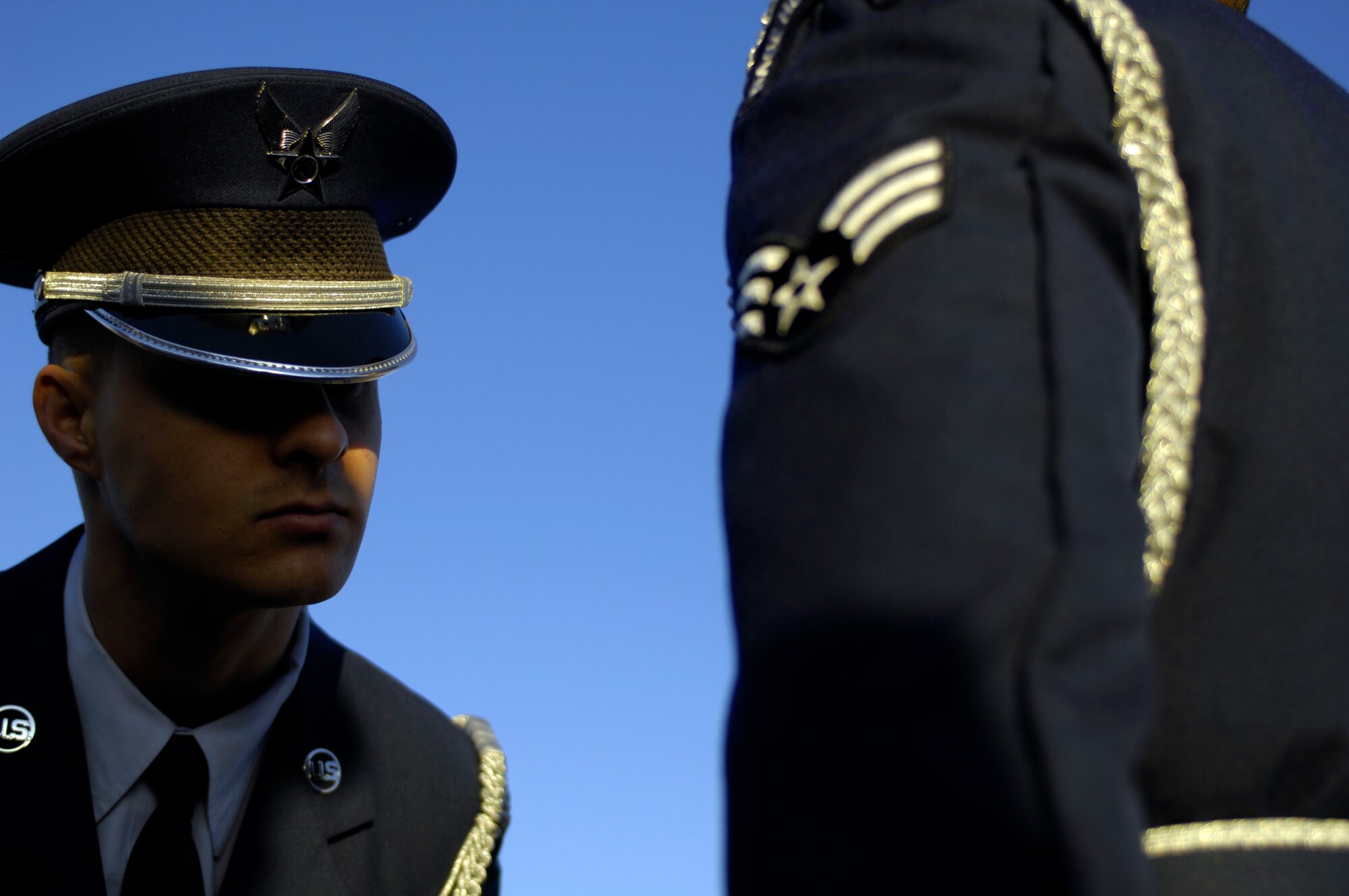 Airman 1st Class Michael Giles, Luke Honor Guard Flight Sergeant, inspects members of the Honor Guard during an open ranks inspection on the morning of Feb. 9, 2010 at Luke Air Force Base, Ariz. Exemplifying the Air Force Core Value of "Excellence in all we do", the Luke Honor Guard is very strict on its member’s appearances. (U.S. Air Force Photo by SSgt Jason Colbert)