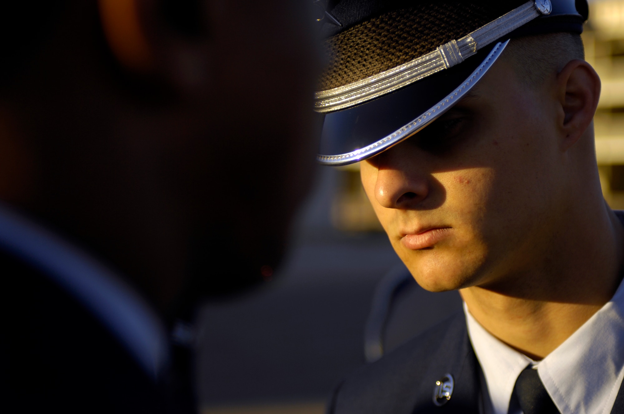 Airman 1st Class Michael Giles, Luke Honor Guard Flight Sergeant, inspects members of the Honor Guard during an open ranks inspection on the morning of Feb. 9, 2010 at Luke Air Force Base, Ariz, . (U.S. Air Force Photo by SSgt Jason Colbert)
