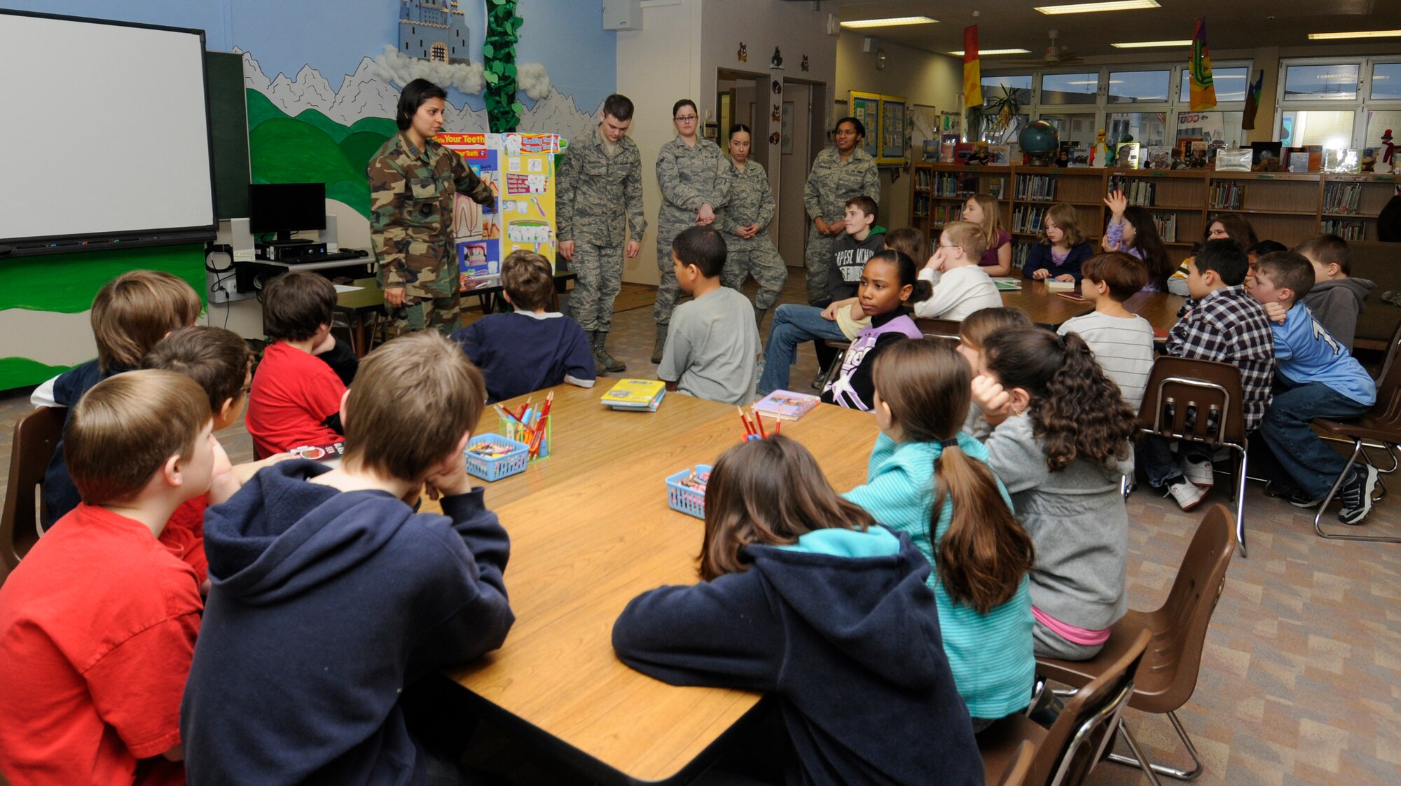 SPANGDAHLEM AIR BASE, Germany –Representatives from the 52nd Dental Squadron teach a fourth grade class the proper brushing and flossing techniques, tooth anatomy, the importance of fluoride and the dangers of smoking Feb. 9 at the Bitburg Elementary School. Each February, the American Dental Association sponsors National Children’s Dental Health Month. In addition to visiting elementary and middle schools, the 52nd DS is opening the Spangdahlem Dental Clinic Feb. 27 to offer walk-ins for children up to 10 years of age. (U.S. Air Force photo/Airman 1st Class Staci Miller)