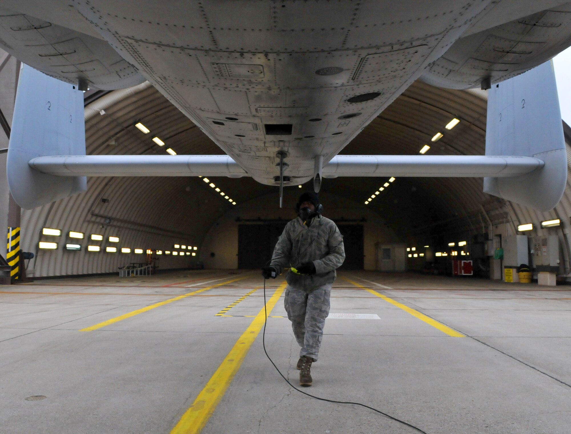SPANGDAHLEM AIR BASE, Germany -- Airman 1st Class Savon Scales, 52nd Aircraft Maintenance Squadron crew chief, performs a final check on an A-10 Thunderbolt II prior to launch Feb. 9 on the flightline. Final checks ensure no leaks are overlooked and items on the aircraft are secure. (U.S. Air Force photo/Airman 1st Class Nick Wilson) 