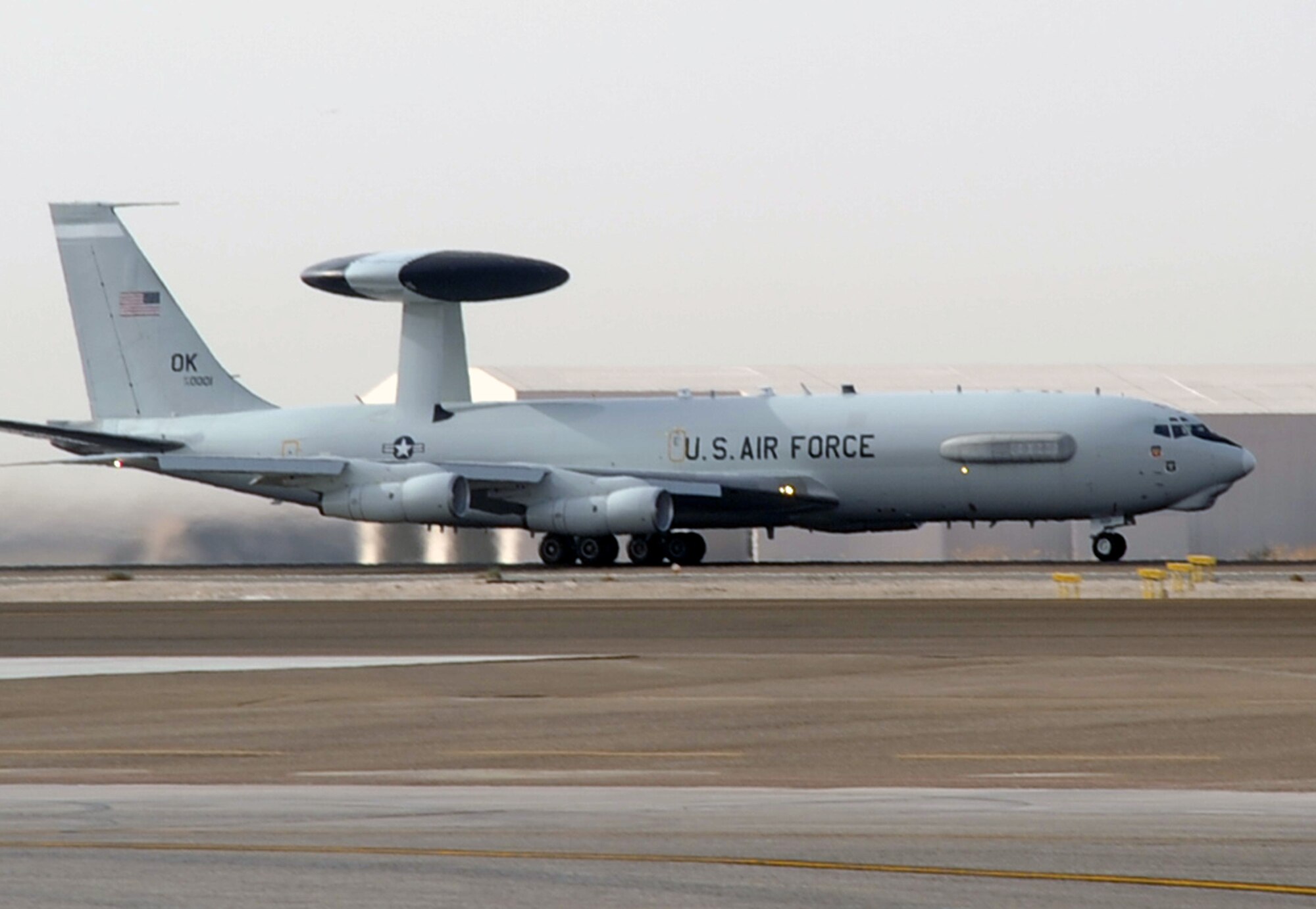 An E-3 Sentry Airborne Warning and Control System aircraft assigned to the 965th Expeditionary Airborne Air Control Squadron is guided down the runway for take-off by its flight crew en route to a combat mission during operations at a non-disclosed base in Southwest Asia on Feb. 11, 2010. The E-3 mission platform, according to its Air Force fact sheet, provides situational awareness of friendly, neutral and hostile activity, command and control of an area of responsibility, battle management of theater forces, all-altitude and all-weather surveillance of the battle space, and early warning of enemy actions during joint, allied and coalition operations. The 965th EAACS is a unit of the 380th Air Expeditionary Wing and supports operations Iraqi Freedom and Enduring Freedom and the Combined Joint Task Force-Horn of Africa. (U.S. Air Force Photo/Master Sgt. Scott T. Sturkol/Released)
