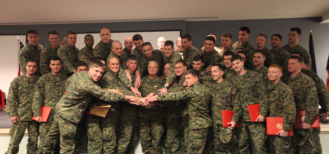 U.S. Marine Corps Forces, Special Operations Command newest Marine special operators took time to gather for a quick picture with Maj. Gen. Paul E. Lefebvre, the commanding general of MARSOC, Feb. 11, at the MARSOC headquarters building auditorium. This is the second class to graduate from the Individual Training Course offered by MARSOC.
