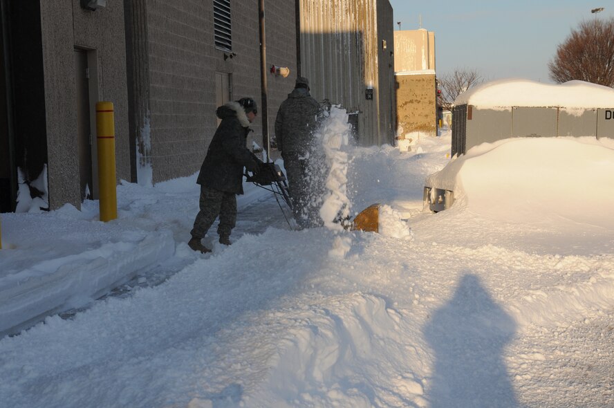 Members of the 193rd Special Operations Wing, PA Air National Guard, Middletown Pennsylvania are busy clearing snow from the flight line, parking lots, roads and sidewalks on their base at Harrisburg International Airport. The Harrisburg area recieved 36 inches of snow from two snow storms between February 4th and 11th 2010. (U.S. Air Force photo by Senior Master Sergeant David Hawkins/Released)