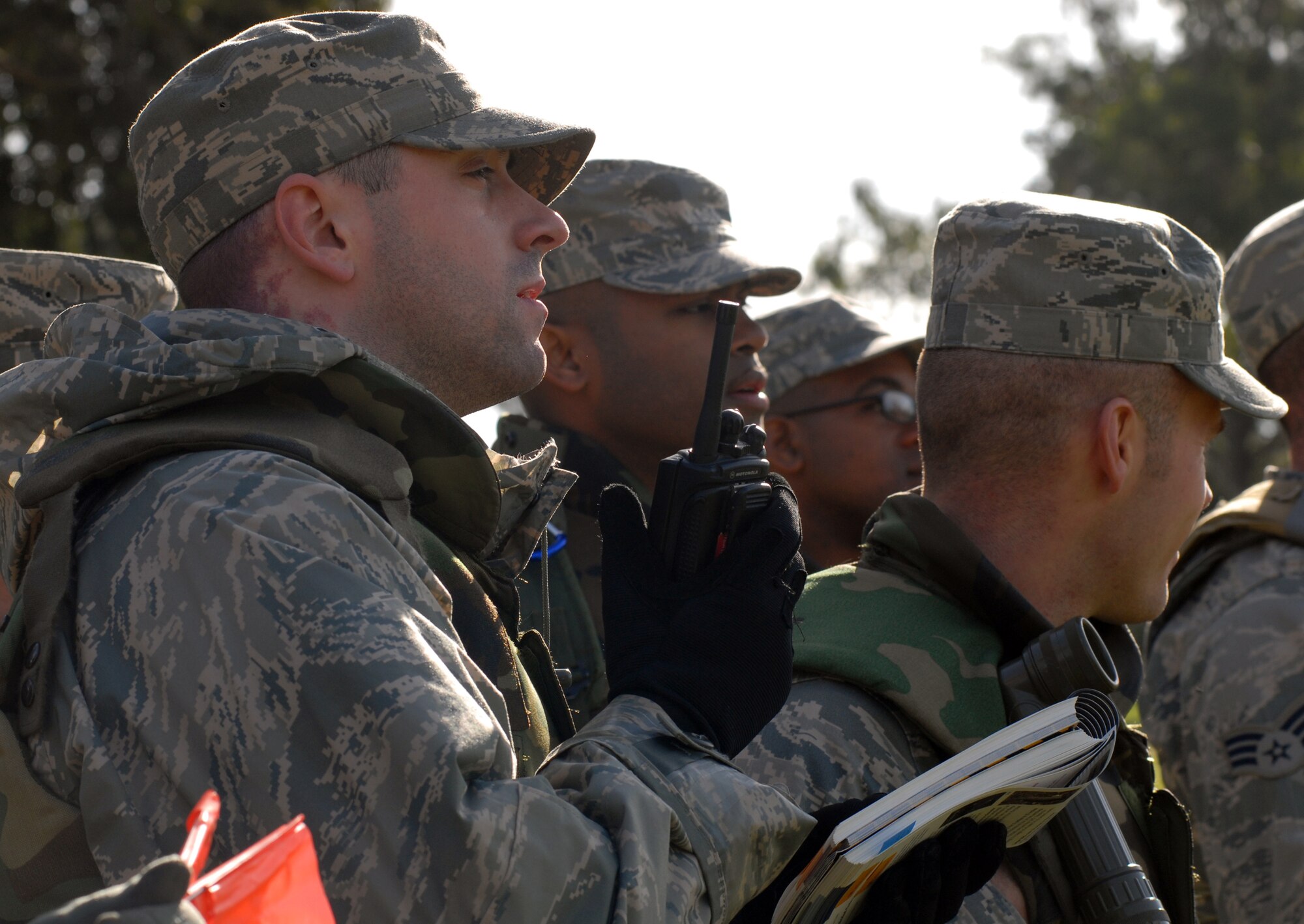 VANDENBERG AIR FORCE BASE, Calif. -- Members of Team Vandenberg practice the recognize, record, retreat and reporting of unexploded ordnance devices at Cocheo Park here Thursday, Feb. 10, 2010 during a North Star exercise. North Star is used to test each Airman's knowledge of self-aid and buddy care, force protection levels, terrorist attacks and many other situations that may arise in a deployed location as covered in the Airman's Manual. (U.S. Air Force photo/Airman 1st Class Kerelin Molina)