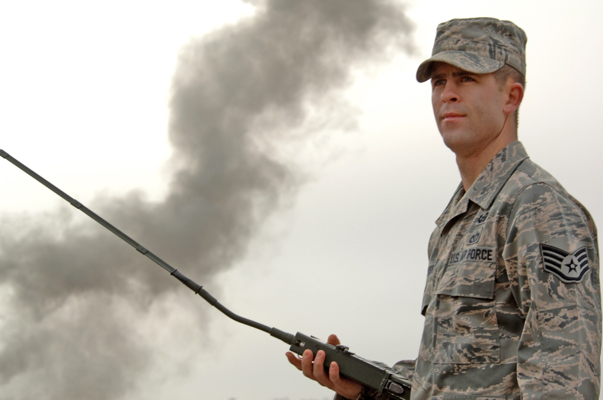 Staff Sgt. Brandon Pfannenstiel uses a remote firing device to set off C-4 during a training session Jan. 19, 2010, at Whiteman Air Force Base, Mo. Sergeant Pfannenstiel is a 509th Civil Engineer Squadron explosive ordnance device technician.(U.S. Air Force photo/Senior Airman Jessica Mae Snow)