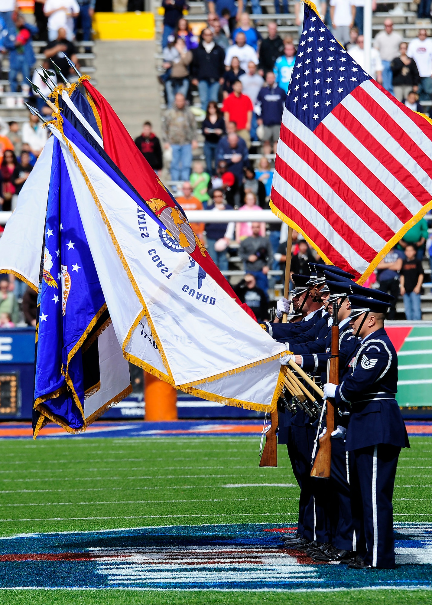 EL PASO, Texas -- The Holloman Air Force Base, N.M., Steel Talon Honor Guard presents the colors as a part of the opening ceremony for the Texas vs. the Nation football game held at the Sun Bowl, Feb. 6. The Steel Talon Honor Guard was one of many different military representatives there to support the game. (U.S. Air Force photo by Senior Airman DeAndre Curtiss) 