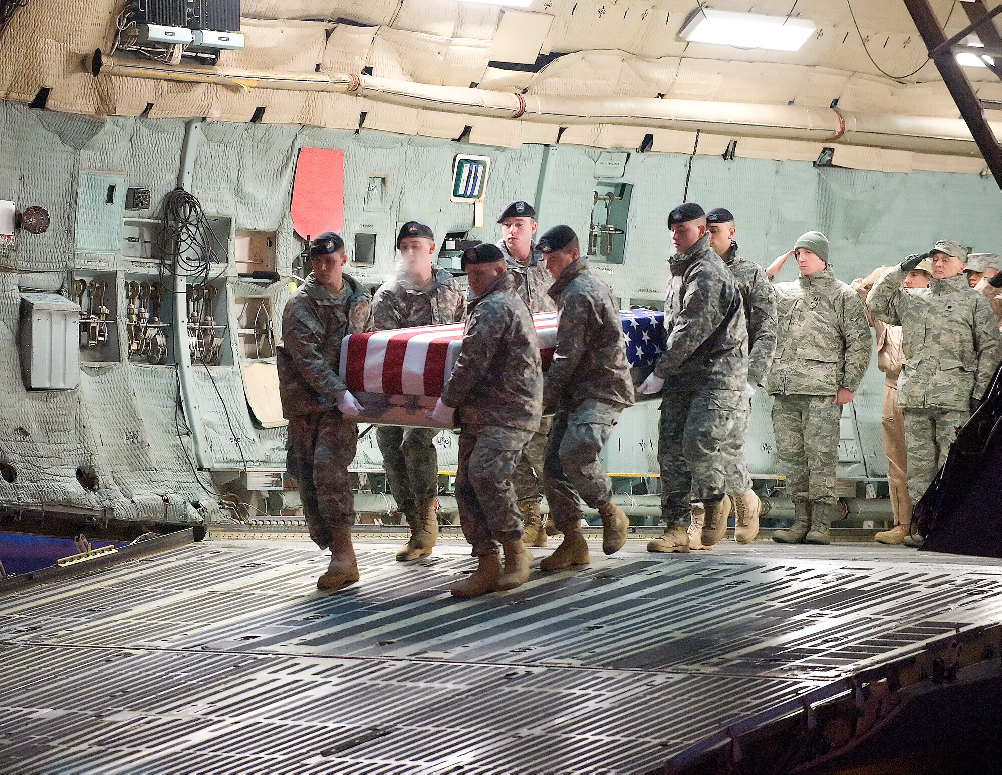 A U.S. Army carry team transfers the remains of Army SGT Dillion Fox of Traverse City, MI., at Dover Air Force Base, Del.,on February 12, 2010. (U.S. Air Force photo/Brianne Zimny. SGT Fox was of the 1st Battalion, 508th Parachute Infantry Regiment, 4th Brigade Combat Team, 82nd Airbourne Division of Fort Bragg, N.C.