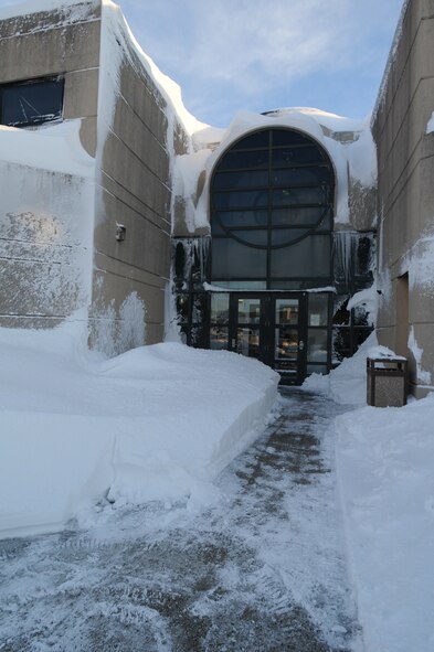 A mound of snow accumulated in front of the headquarters building of the 193rd Special Operations Wing, PA Air National Guard, Middletown Pennsylvania, after a second snow storm dropped an additional 18 inches of snow. The Harrisburg area recieved 36 inches of snow from two storms that blanketed the area in the last week. (U.S. Air Force photo by Senior Master Sergeant David Hawkins/Released)