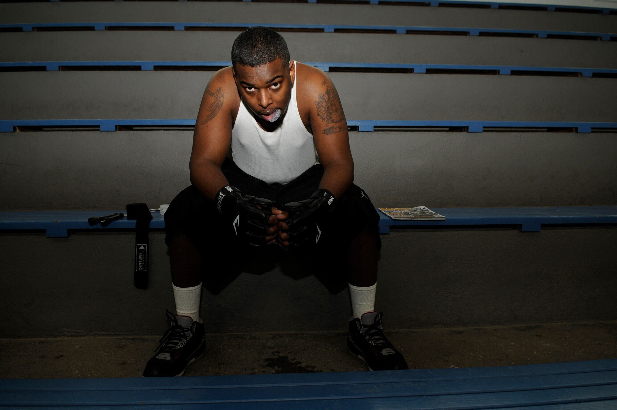 Travis Perry, spouse of U.S. Air Force Airman 1st Class Brittany Perry, 86th Airlift Wing Public Affairs, poses for a photo at the Vogelweh Fitness Center, Vogelweh Air Base, Germany, Feb. 9, 2010. Mr. Perry has been practicing Jiu-jitsu since Oct. 2009 to maintain physical fitness. (U.S. Air Force photo by Airman 1st Class Brittany Perry)