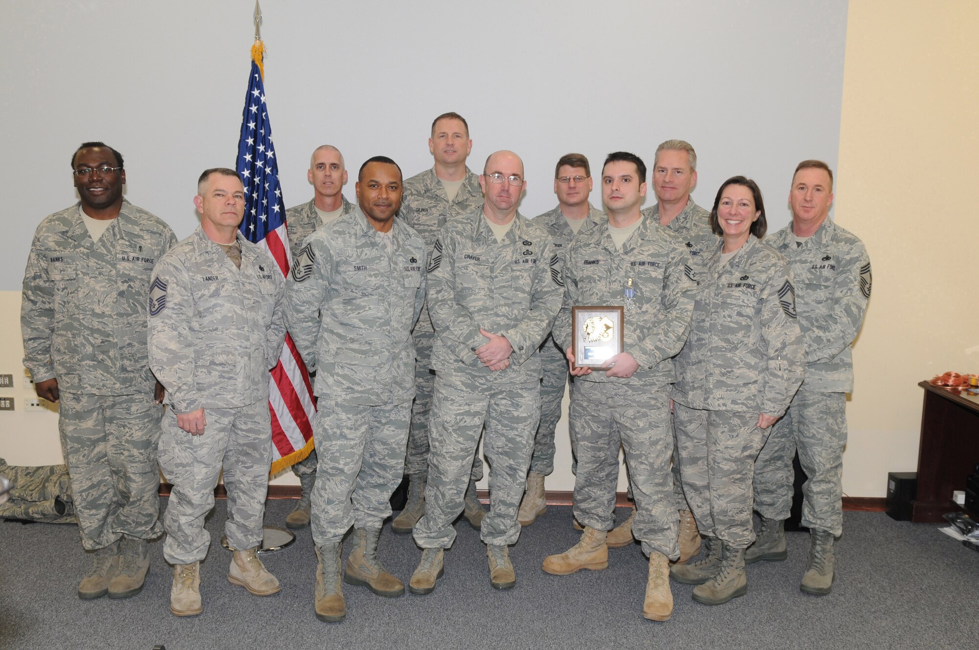 Staff Sgt. Joseph Franks, 603rd Air Control Squadron, is presented the Aviano Chief's Choice Award by Aviano Chiefs Feb.11th, 2010. Aviano Chiefs present the Chief's Choice Award monthly to an Airman who clearly exceeds Air Force Standards in the areas of dress and appearance, bearing, and exceptional behavior in performance of their duties and in relationships with others. (Air Force photo/ Staff Sgt. MercedesKimble L. Crossland)  