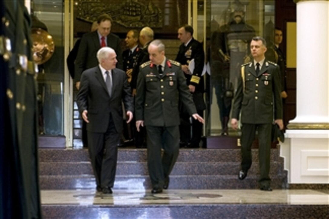 Secretary of Defense Robert M. Gates walks with Turkish Chief of General Staff Gen. Ilker Basbug after their meeting in Ankara, Turkey, on Feb. 6, 2010.  