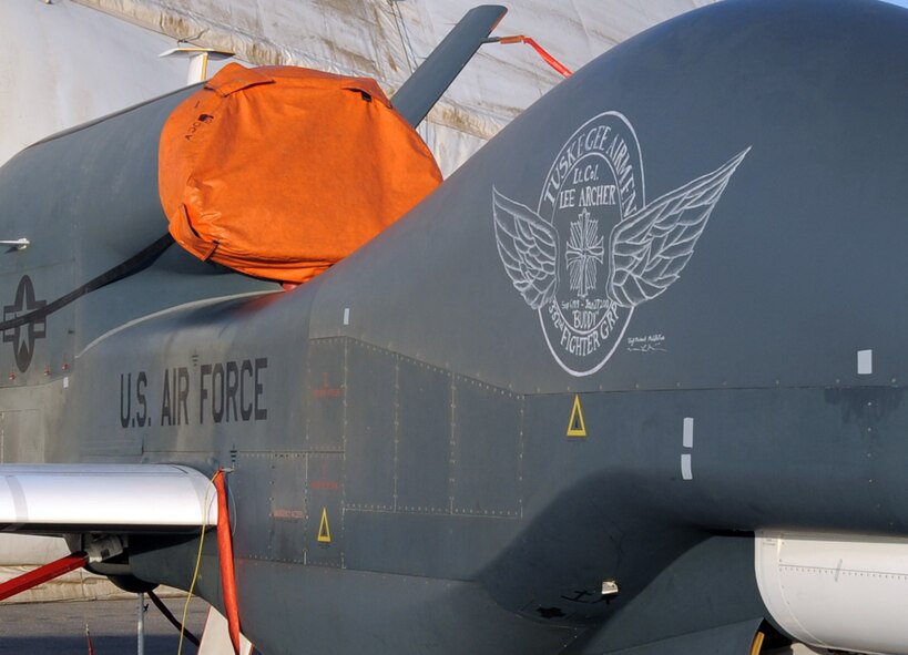 Pictured on Feb. 12, 2010, is chalk nose art on an RQ-4 Global Hawk created by Staff Sgt. Michael Middleton of the 380th Expeditionary Aircraft Maintenance Squadron's Global Hawk aircraft maintenance unit at a non-disclosed base in Southwest Asia honoring Tuskegee Airman Lt. Col. Lee Archer who died Jan. 27 at the age of 90 in New York City. (U.S. Air Force Photo/Master Sgt. Scott T. Sturkol/Released)