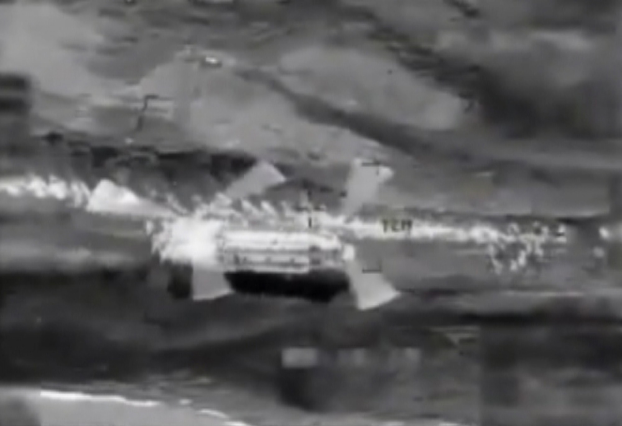 A snapshop from an MQ-1 Predator aircraft system over Afghanistan shows an International Security Assistance Force Ch-47 helicopter picking up stranded and injured Afghanis by the dozes after a series of avalanches in the area of the Salang Tunnel in the Parwarn Provice buried major sections of the road that connects the Kabul area with eastern parts of the country. U.S. Airmen from the 380th Air Expeditionary Squadron from an undisclosed base in Southwest Asia provided support from above using their E-3 Sentry Airborne Warning and Control Systems aircraft. They cleared the sky for the air rescue effort, coordinated air refueling, managed communications and provided overwatch support. (U.S. Air Force Photo)