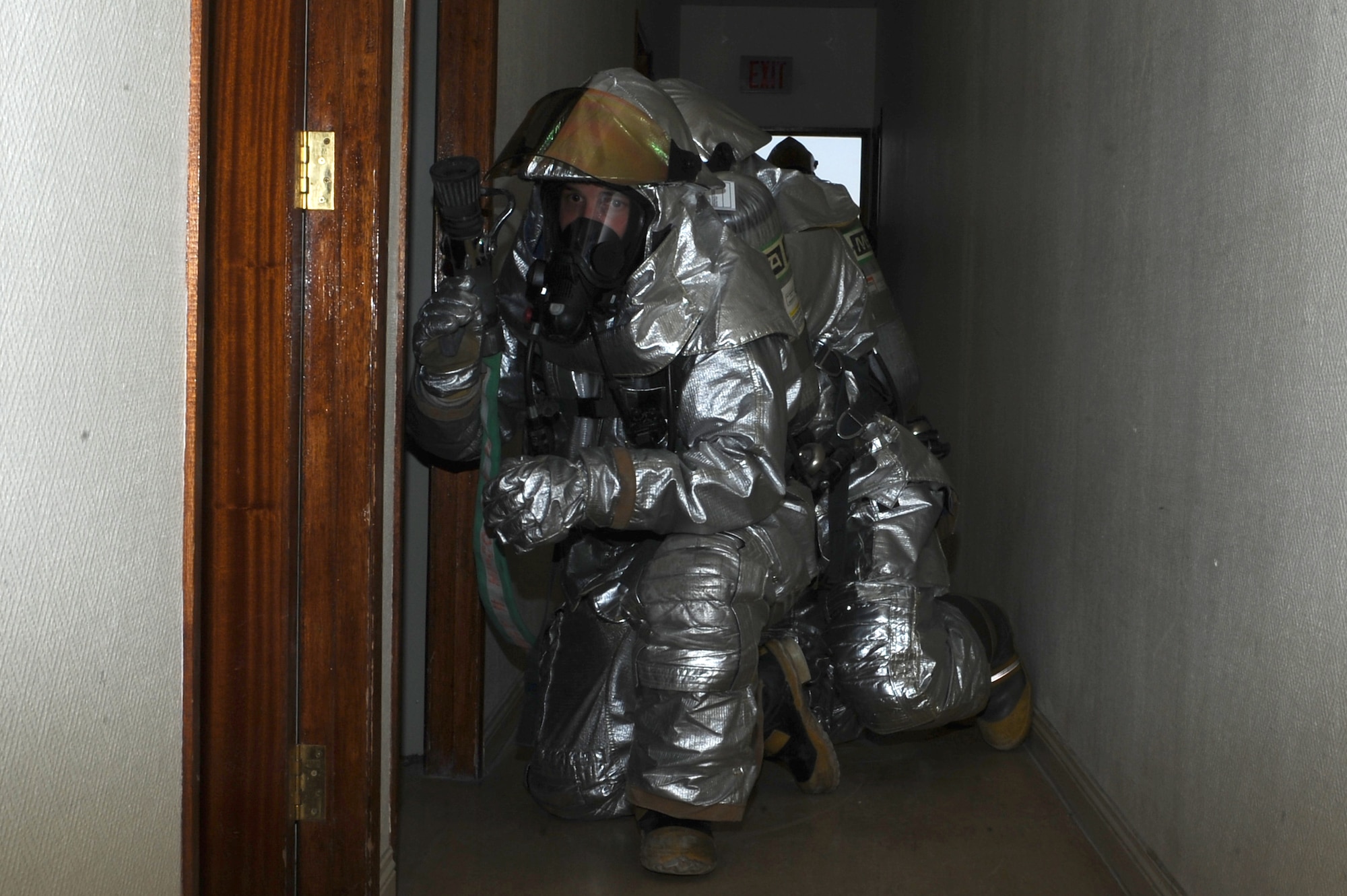 Senior Airman Michael Waffle, 379th Expeditionary Civil Engineer Squadron firefighter, approaches a room during an in-house training exercise at a non-disclosed Southwest Asia location Feb. 10, 2010. (U.S. Air Force photo by Senior Airman Kasey Zickmund)[RELEASED]