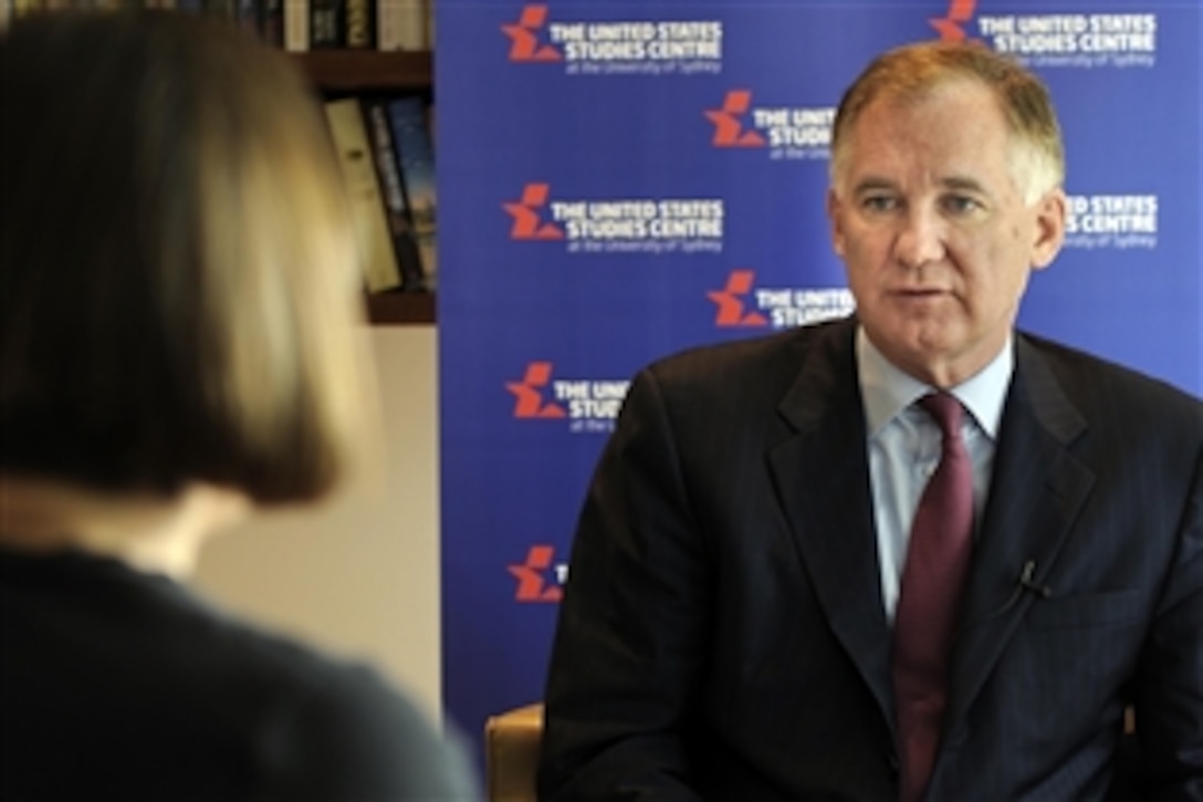 Deputy Defense Secretary William J. Lynn III talks with a reporter from the University of Sydney’s U.S. Studies Centre, Feb. 13, 2010. Lynn is participating in meetings with Australian government, business and civic leaders.