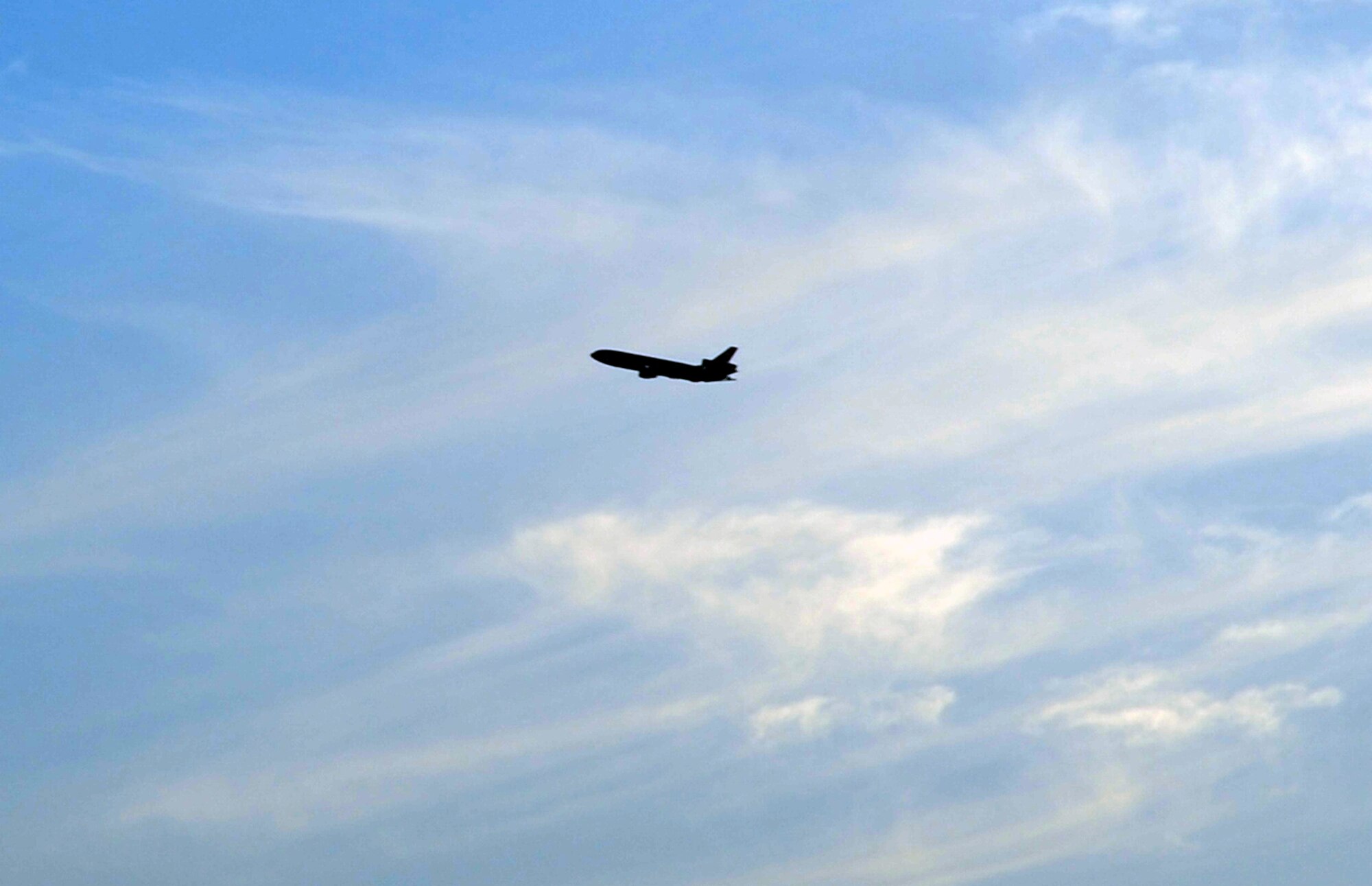 A KC-10 Extender flies off for a mission during operations for the 380th Air Expeditionary Wing at a non-disclosed location in Southwest Asia on Feb. 12, 2010.  The KC-10 is forward deployed to the U.S. Central Command area of responsibility from Joint Base McGuire-Dix-Lakehurst, N.J. (U.S. Air Force Photo/Master Sgt. Scott T. Sturkol/Released)