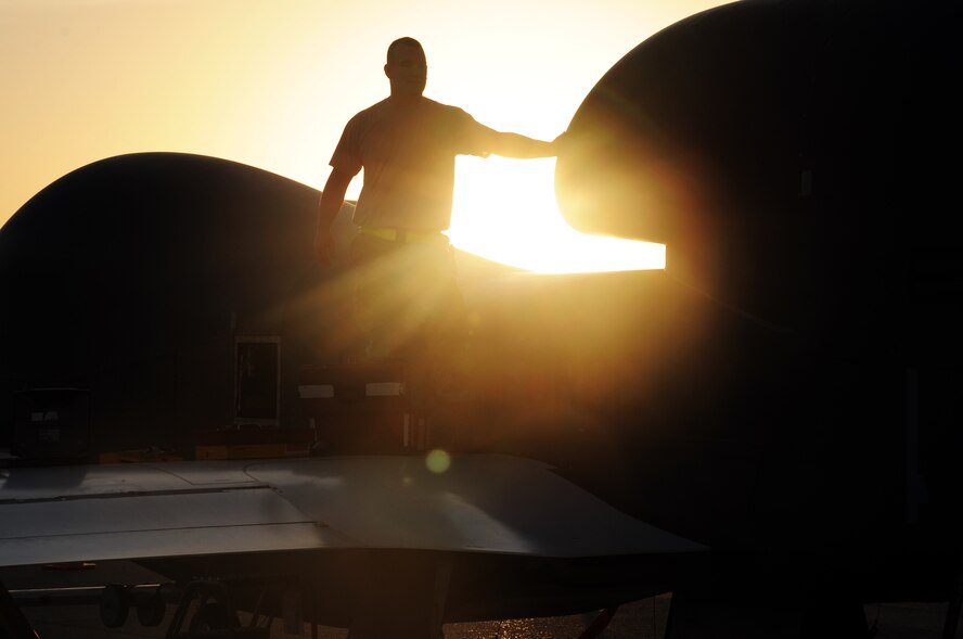 Staff Sgt. Michael Goenner, an RQ-4 Global Hawk crew chief with the 380th Expeditionary Aircraft Maintenance Squadron Hawk aircraft maintenance unit, goes through pre-flight servicing while preparing a Global Hawk for a combat mission Feb. 12, 2010, at a non-disclosed base in Southwest Asia. The RQ-4s, assigned to the 380th Air Expeditionary Wing and deployed from Beale Air Force Base, Calif., achieved 1,500 combat sorties and 30,000 combat flying hours on Feb. 10 and 11 respectively.  Sergeant Goenner is deployed from the 9th Aircraft Maintenance Squadron at Beale AFB, and his hometown is Becker, Minn. (U.S. Air Force Photo/Master Sgt. Scott T. Sturkol/Released)
