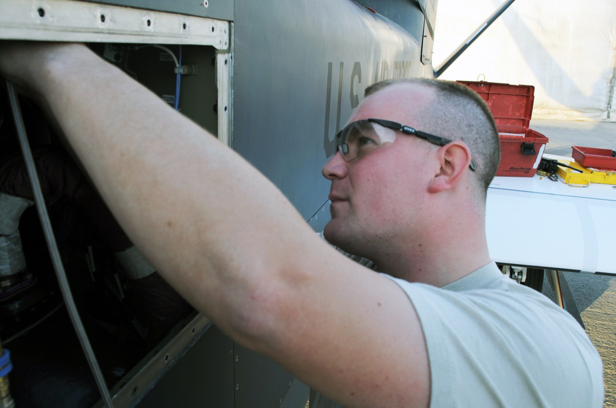 Staff Sgt. Michael Goenner, an RQ-4 Global Hawk crew chief with the 380th Expeditionary Aircraft Maintenance Squadron Hawk aircraft maintenance unit, goes through pre-flight servicing while preparing a Global Hawk for a combat mission Feb. 12, 2010, at a non-disclosed base in Southwest Asia. The RQ-4s, assigned to the 380th Air Expeditionary Wing and deployed from Beale Air Force Base, Calif., achieved 1,500 combat sorties and 30,000 combat flying hours on Feb. 10 and 11 respectively.  Sergeant Goenner is deployed from the 9th Aircraft Maintenance Squadron at Beale AFB, and his hometown is Becker, Minn. (U.S. Air Force Photo/Master Sgt. Scott T. Sturkol/Released)